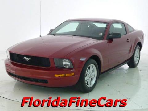 Dark Candy Apple Red Ford Mustang V6 Deluxe Coupe.  Click to enlarge.
