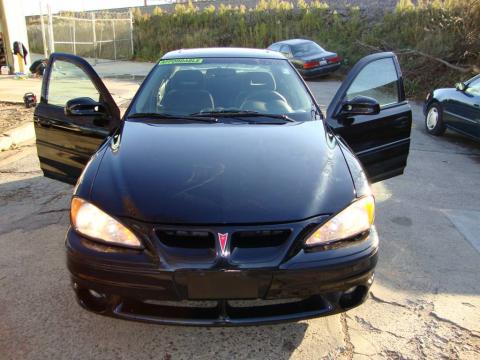 Black Pontiac Grand Am GT Sedan.  Click to enlarge.