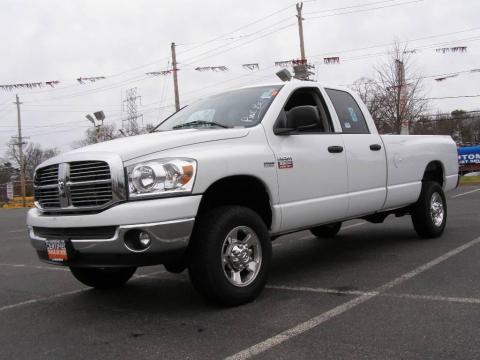 Bright White Dodge Ram 2500 Big Horn Quad Cab 4x4.  Click to enlarge.