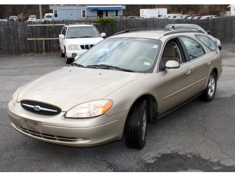 Harvest Gold Metallic Ford Taurus SE Wagon.  Click to enlarge.
