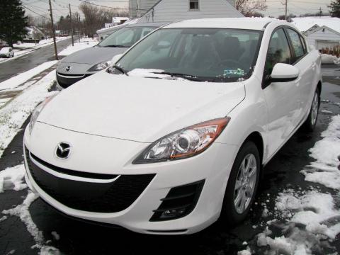 Crystal White Pearl Mica Mazda MAZDA3 i Touring 4 Door.  Click to enlarge.