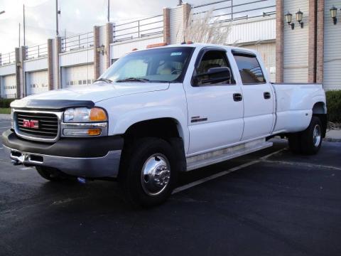 Summit White GMC Sierra 3500 SLT Crew Cab 4x4 Dually.  Click to enlarge.