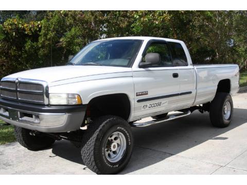 Bright White Dodge Ram 2500 SLT Quad Cab 4x4.  Click to enlarge.