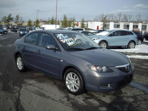 Metropolitan Gray Mica Mazda MAZDA3 i Touring Sedan.  Click to enlarge.
