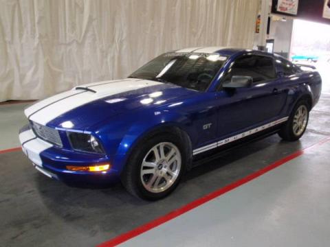 Sonic Blue Metallic Ford Mustang V6 Deluxe Coupe.  Click to enlarge.