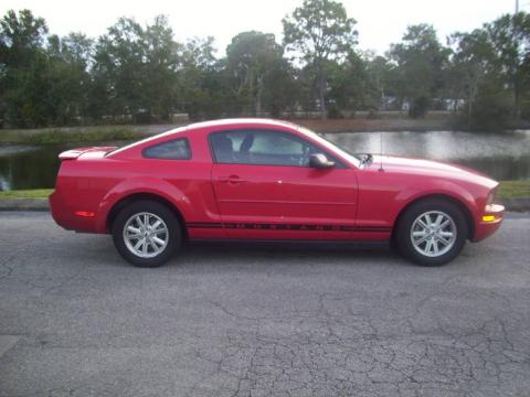 Torch Red Ford Mustang V6 Deluxe Coupe.  Click to enlarge.