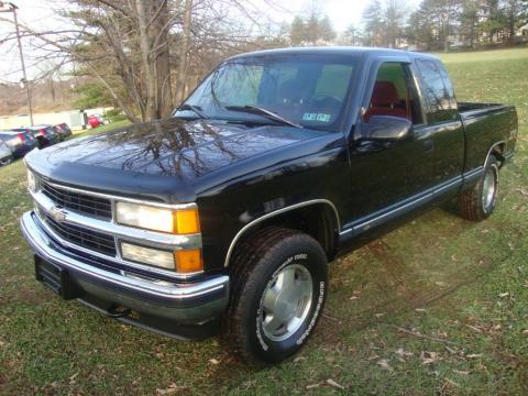 Black Chevrolet C/K K1500 Silverado Extended Cab 4x4.  Click to enlarge.