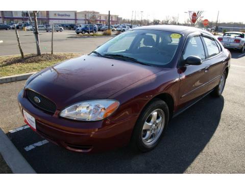 Merlot Pearl Clearcoat Ford Taurus SE.  Click to enlarge.