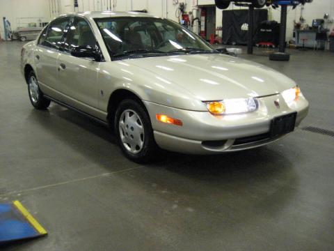 Gold Saturn S Series SL1 Sedan.  Click to enlarge.