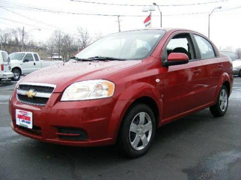 Sport Red Metallic Chevrolet Aveo LS Sedan.  Click to enlarge.