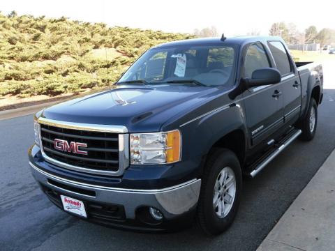 Midnight Blue Metallic GMC Sierra 1500 SLE Crew Cab 4x4.  Click to enlarge.