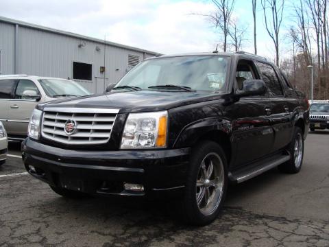 Black Raven Cadillac Escalade EXT AWD. Click to enlarge. Black Raven Cadillac Escalade EXT AWD. Click to enlarge.