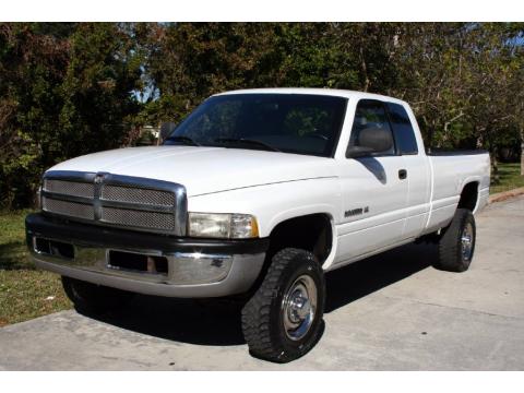 Bright White Dodge Ram 2500 ST Quad Cab 4x4.  Click to enlarge.