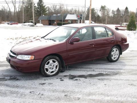 Black Cherry Metallic Nissan Altima GXE.  Click to enlarge.