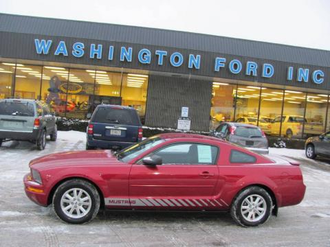 Redfire Metallic Ford Mustang V6 Deluxe Coupe.  Click to enlarge.