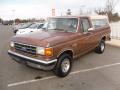 Front 3/4 View of 1990 Ford F150 XLT Lariat Regular Cab #1