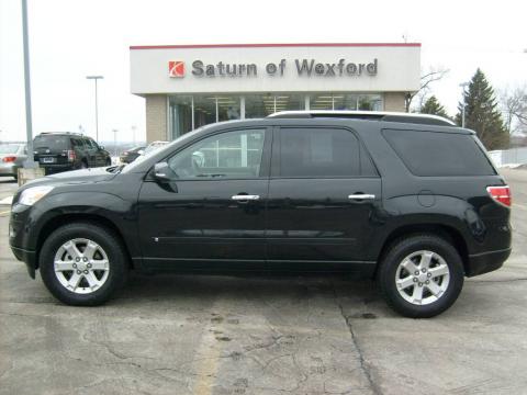 Carbon Flash Black Saturn Outlook XE AWD.  Click to enlarge.
