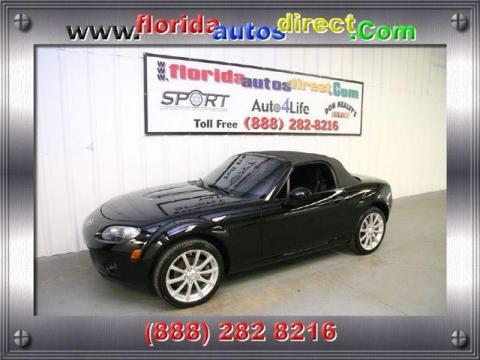 Brilliant Black Mazda MX-5 Miata Touring Roadster.  Click to enlarge.