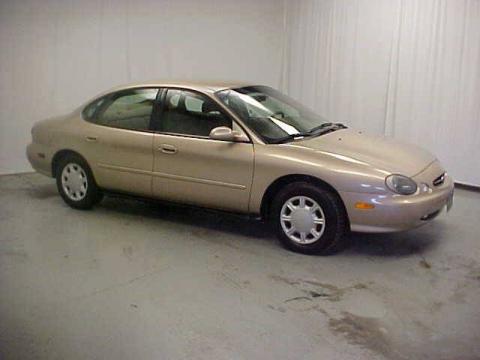 Light Prairie Tan Metallic Ford Taurus LX.  Click to enlarge.