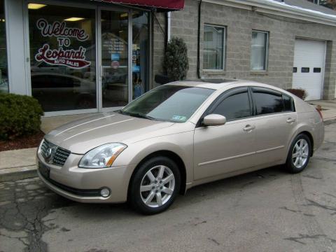 Coral Sand Metallic Nissan Maxima 3.5 SL.  Click to enlarge.