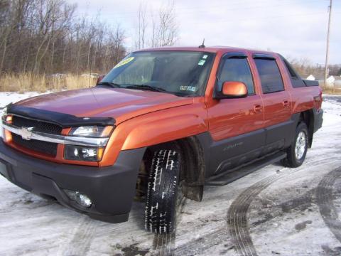 Sunburst Orange Metallic Chevrolet Avalanche 1500 Z71 4x4.  Click to enlarge.