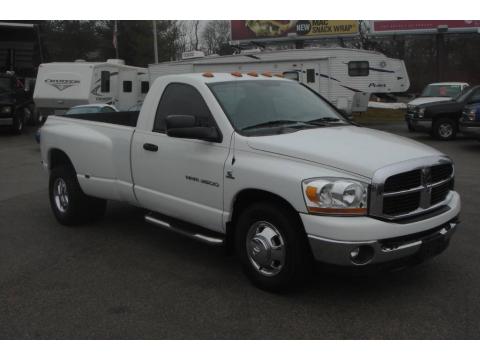 Bright White Dodge Ram 3500 SLT Regular Cab Dually.  Click to enlarge.