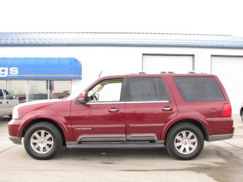 Merlot Red Metallic Lincoln Navigator Luxury 4x4.  Click to enlarge.