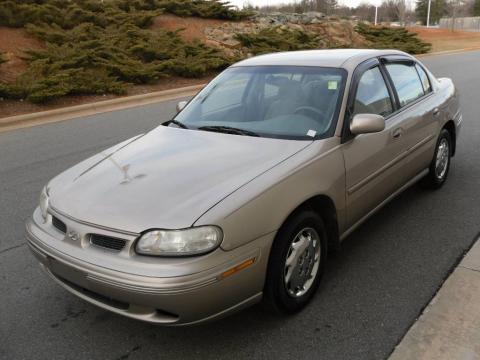 Sand Beige Metallic Oldsmobile Cutlass GL.  Click to enlarge.