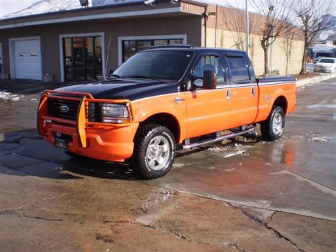 Black/Competition Orange Ford F250 Super Duty Harley Davidson Crew Cab 4x4.  Click to enlarge.