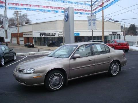 Sand Beige Metallic Oldsmobile Cutlass GL.  Click to enlarge.