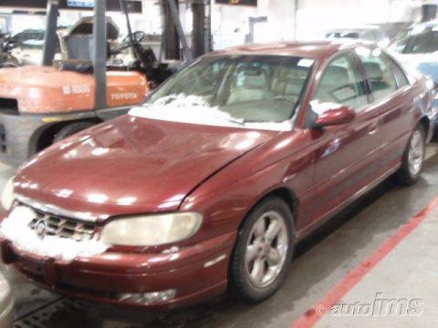 Cranberry Red Cadillac Catera . Click to enlarge. Cranberry Red Cadillac Catera . Click to enlarge.