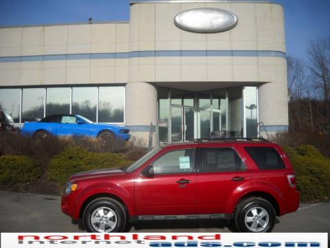 Sangria Red Metallic Ford Escape XLT V6 4WD. Click to enlarge. Sangria Red Metallic Ford Escape XLT V6 4WD. Click to enlarge.