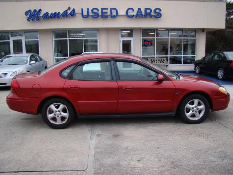 Toreador Red Metallic Ford Taurus SES.  Click to enlarge.