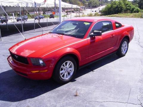 Torch Red Ford Mustang V6 Deluxe Coupe.  Click to enlarge.