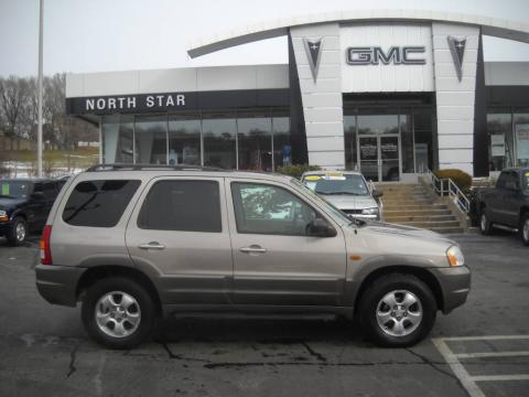 Parchment Gold Metallic Mazda Tribute LX V6 4WD.  Click to enlarge.