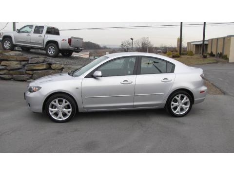 Sunlight Silver Metallic Mazda MAZDA3 i Touring Sedan.  Click to enlarge.