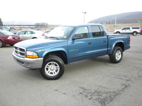 Atlantic Blue Pearl Dodge Dakota SLT Quad Cab 4x4.  Click to enlarge.