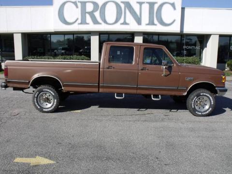 Desert Tan Metallic Ford F350 XLT Crew Cab 4x4.  Click to enlarge.