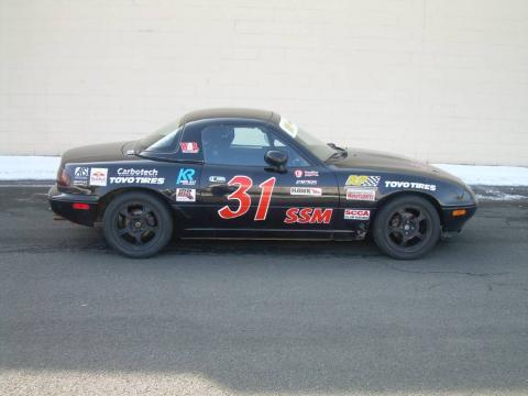 Brilliant Black Mazda MX-5 Miata Roadster.  Click to enlarge.