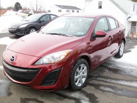 Copper Red Mica Mazda MAZDA3 i Touring 4 Door.  Click to enlarge.