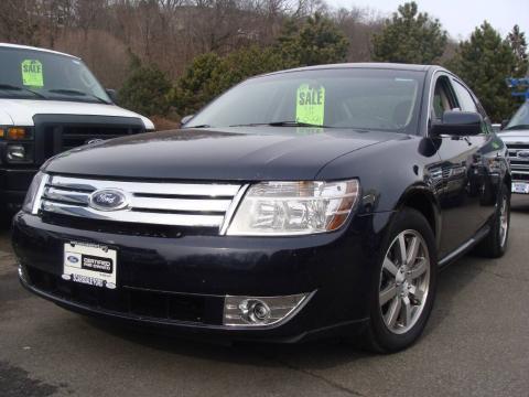 Dark Ink Blue Metallic Ford Taurus SEL.  Click to enlarge.