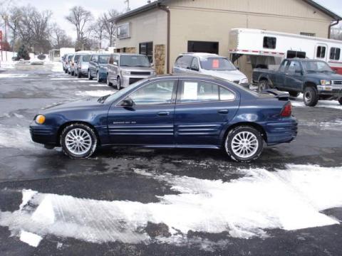 Navy Blue Metallic Pontiac Grand Am SE Sedan.  Click to enlarge.