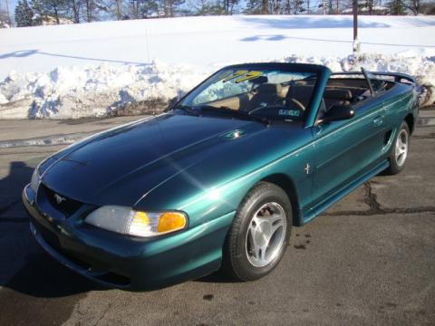 Dark Green Satin Metallic Ford Mustang V6 Convertible.  Click to enlarge.