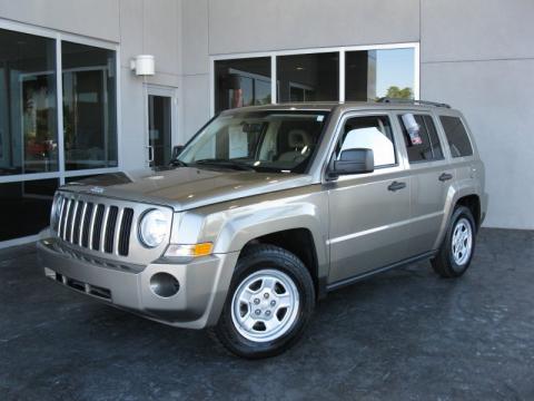 Light Khaki Metallic Jeep Patriot Sport.  Click to enlarge.