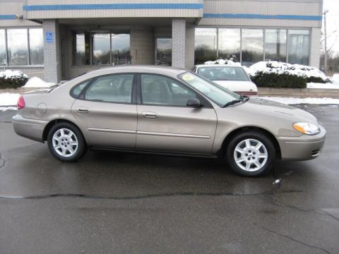 Arizona Beige Metallic Ford Taurus SE.  Click to enlarge.