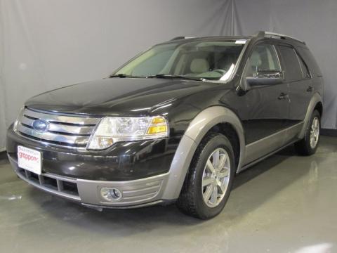 Tuxedo Black Metallic Ford Taurus X SEL. Click to enlarge. Tuxedo Black Metallic Ford Taurus X SEL. Click to enlarge.