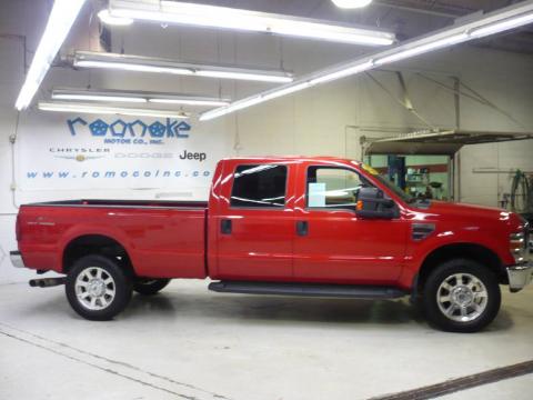 Bright Red Ford F350 Super Duty Lariat Crew Cab 4x4.  Click to enlarge.