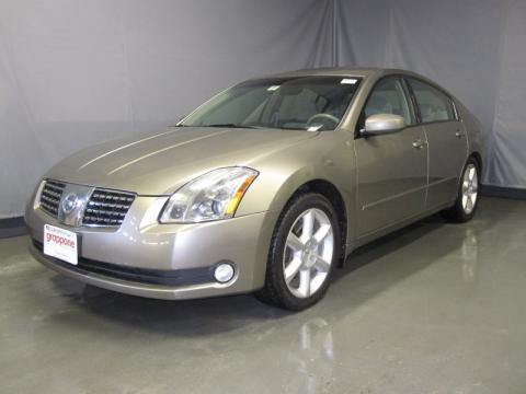 Coral Sand Metallic Nissan Maxima 3.5 SE.  Click to enlarge.