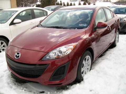 Copper Red Mica Mazda MAZDA3 i Touring 4 Door.  Click to enlarge.