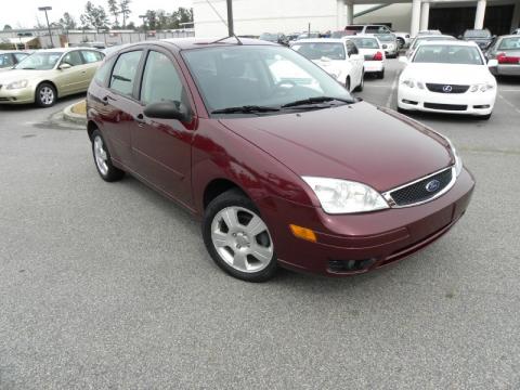 Dark Toreador Red Metallic Ford Focus ZX5 SES Hatchback.  Click to enlarge.